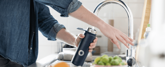 Water bottle with faucet